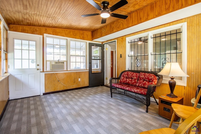 sunroom featuring plenty of natural light and cooling unit