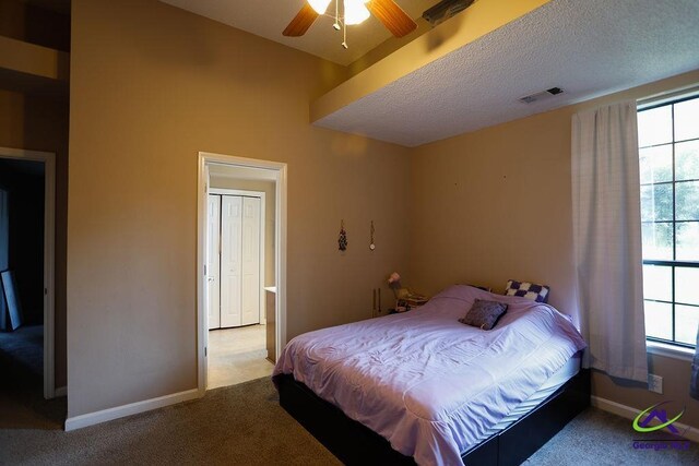 209 Ridgestone, Warner Robins, GA 31088 - bedroom with carpet, baseboards, a textured ceiling, and a ceiling fan