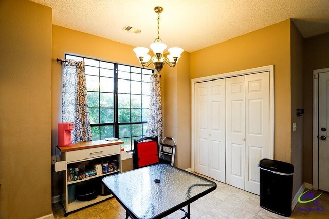 209 Ridgestone, Warner Robins, GA 31088 - playroom with a chandelier and baseboards