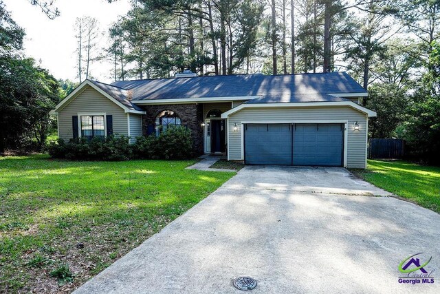 209 Ridgestone, Warner Robins, GA 31088 - view of front facade with a garage and driveway