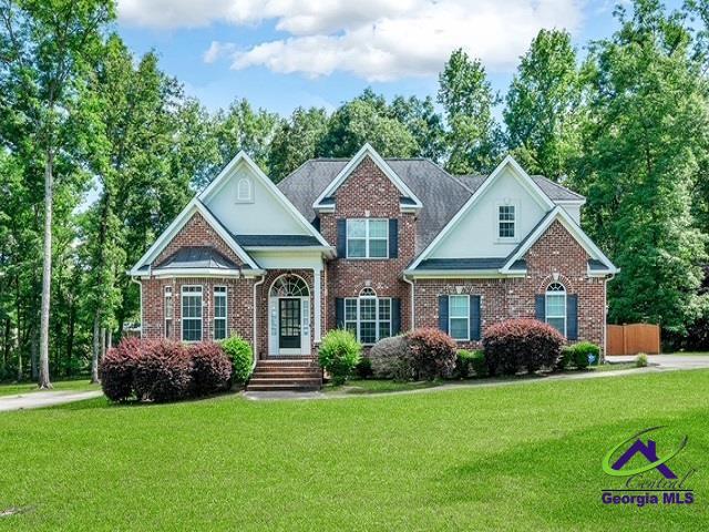 163 Broadleaf Dr, Macon, GA 31210 - view of front of house featuring a front lawn and brick siding