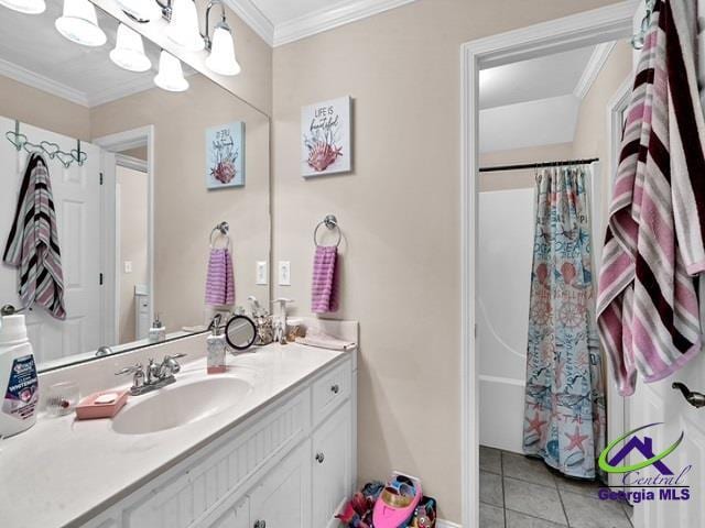 163 Broadleaf Dr, Macon, GA 31210 - full bath featuring crown molding, tile patterned flooring, vanity, a shower with shower curtain, and baseboards