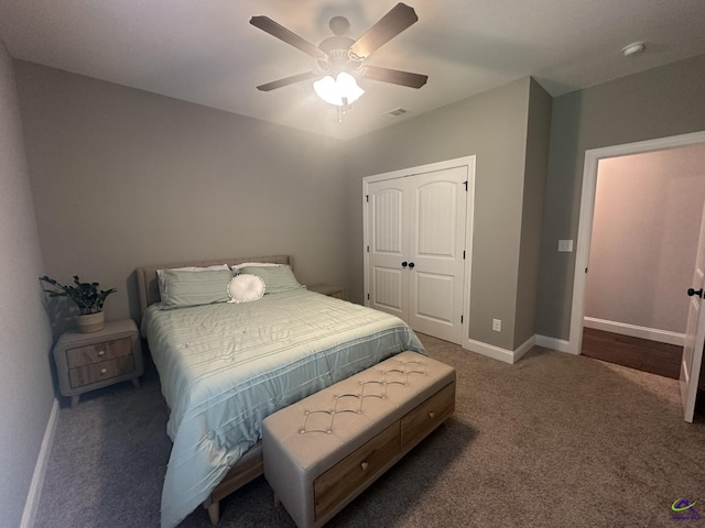 bedroom featuring carpet flooring, a closet, baseboards, and ceiling fan