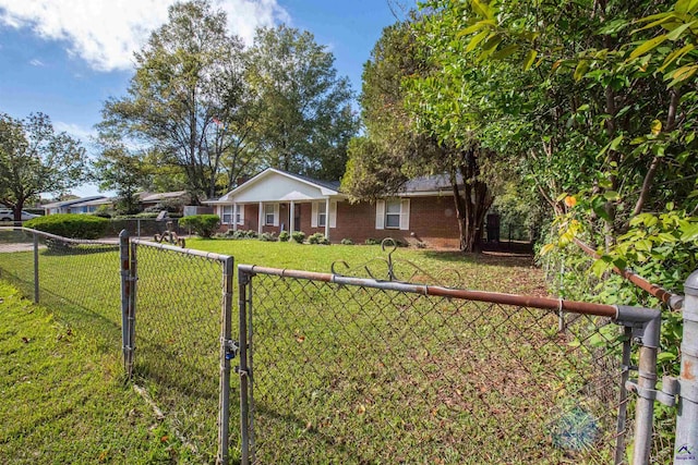 111 Briarwood Dr, Warner Robins, GA 31093 - ranch-style house with brick siding and a gate