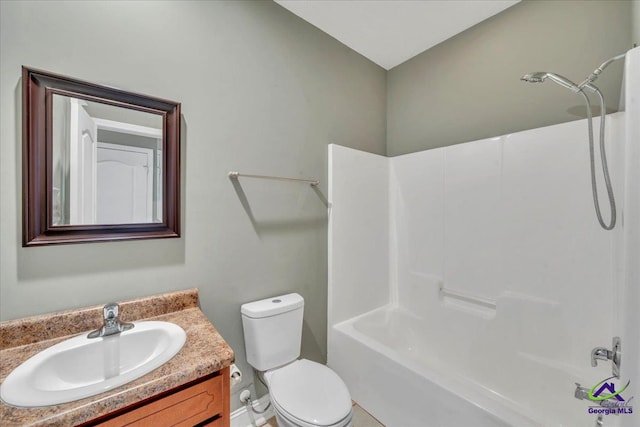 full bath featuring shower / tub combination, vanity, and toilet