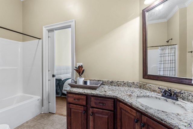 full bathroom featuring tile patterned floors, vanity, shower / tub combo with curtain, and ornamental molding