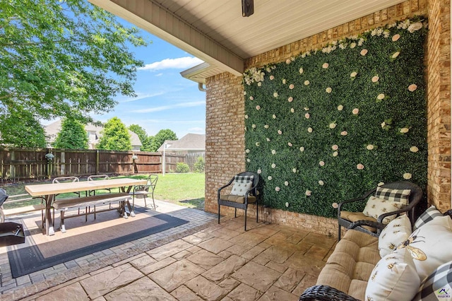 view of patio featuring outdoor dining space and an outdoor living space