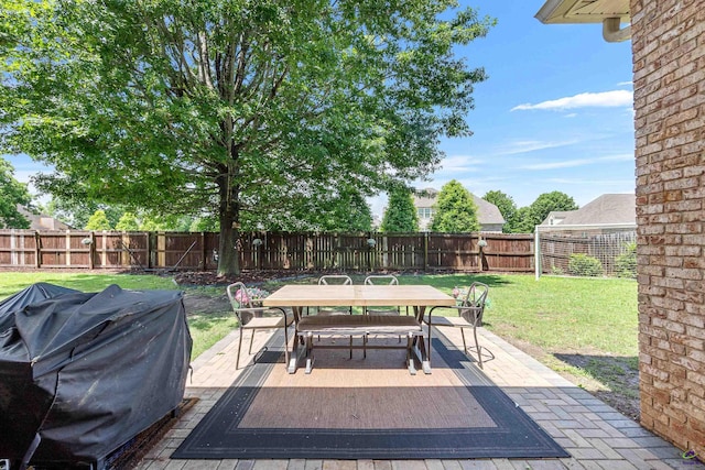 view of patio / terrace featuring outdoor dining space and area for grilling