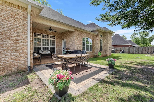 view of patio / terrace with ceiling fan and outdoor dining area