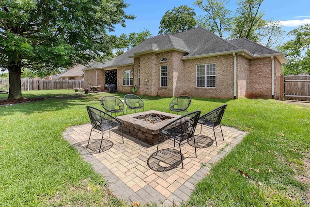 view of patio / terrace with a fire pit