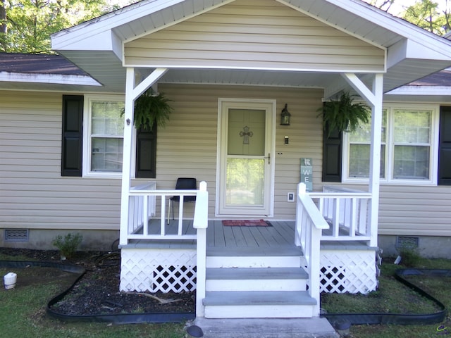 871 Chisholm Trl, Macon, GA 31220 - doorway to property featuring covered porch and crawl space