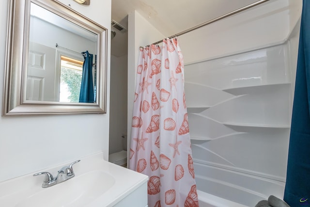 22 Waterford Way, Hawkinsville, GA 31036 - full bath featuring shower / bath combo, vanity, and toilet