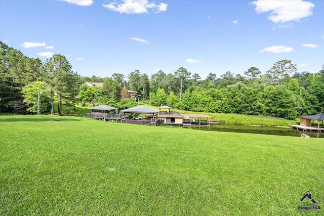 view of green lawn with a gazebo