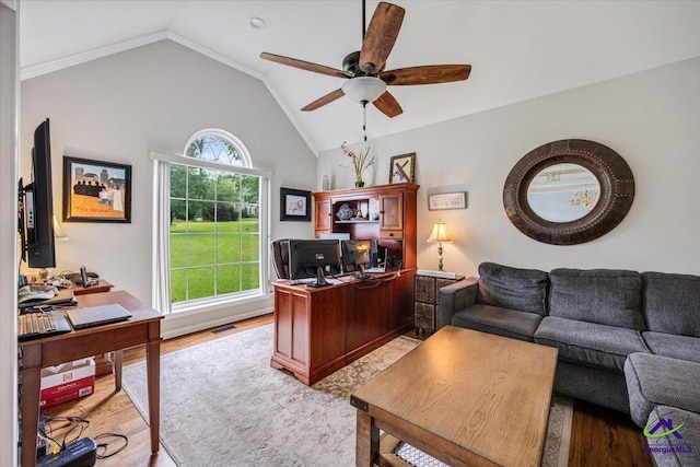 office with lofted ceiling, ceiling fan, and light wood-style floors