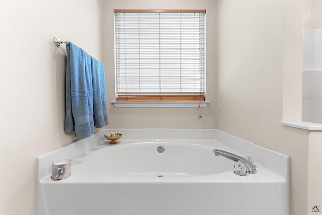 full bath with a garden tub