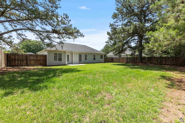 rear view of house featuring a patio
