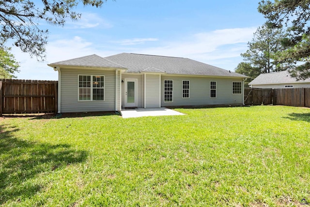 rear view of property with a patio area