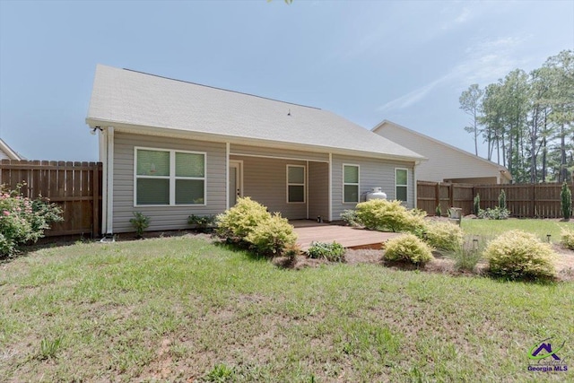 136 Sourwood Ln, Centerville, GA 31093 - back of property with a wooden deck