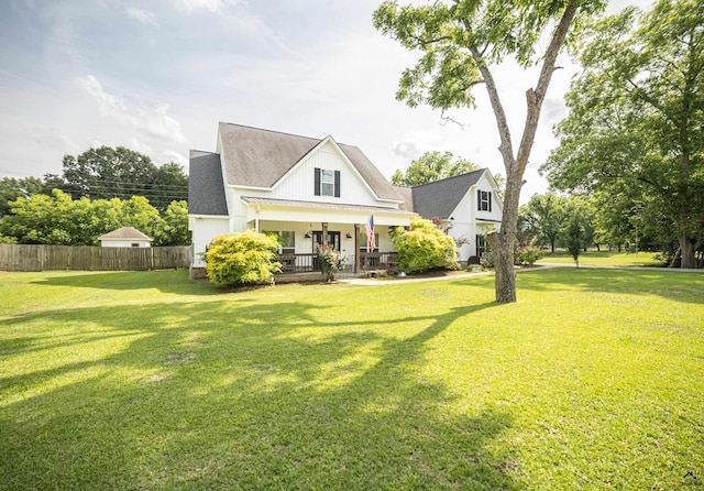 115 Lanier Loop, Kathleen, GA 31047 - modern farmhouse with a porch, roof with shingles, and board and batten siding