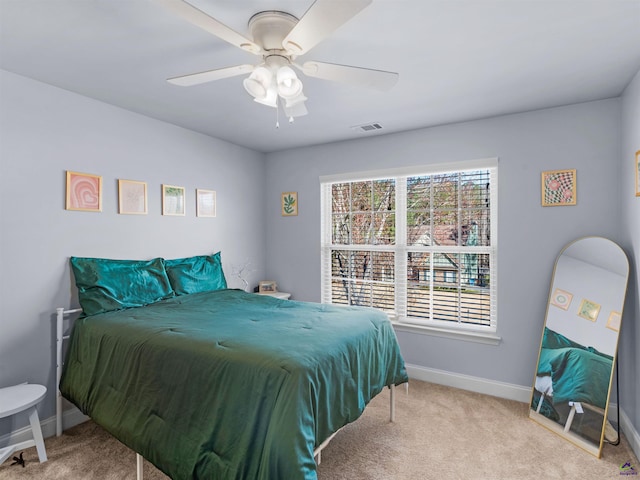 427 Oscar Ct, Mcdonough, GA 30252 - bedroom with carpet floors, baseboards, and ceiling fan