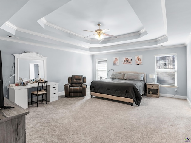 427 Oscar Ct, Mcdonough, GA 30252 - bedroom with a tray ceiling, crown molding, light carpet, ceiling fan, and baseboards
