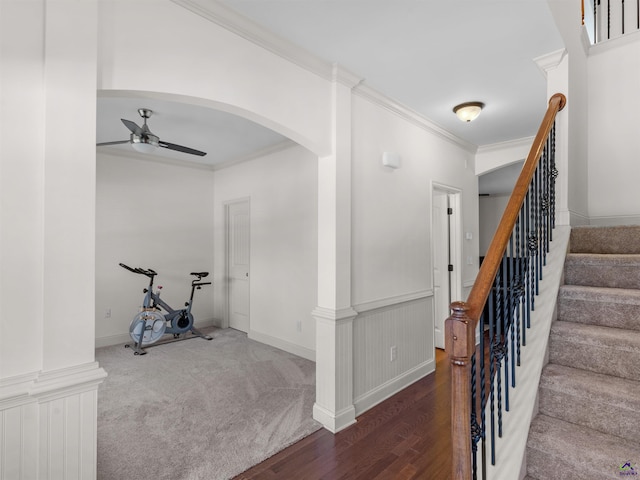 427 Oscar Ct, Mcdonough, GA 30252 - carpeted foyer entrance featuring ceiling fan, ornamental molding, arched walkways, stairs, and wood finished floors
