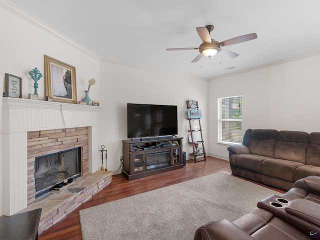 427 Oscar Ct, Mcdonough, GA 30252 - living room featuring crown molding, wood finished floors, ceiling fan, and a fireplace