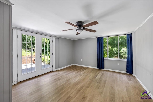 3015 Clairmont Ave, Macon, GA 31204 - unfurnished room with french doors, light wood-type flooring, healthy amount of natural light, and a ceiling fan