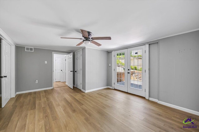 3015 Clairmont Ave, Macon, GA 31204 - unfurnished bedroom featuring access to outside, french doors, wood finished floors, baseboards, and ornamental molding