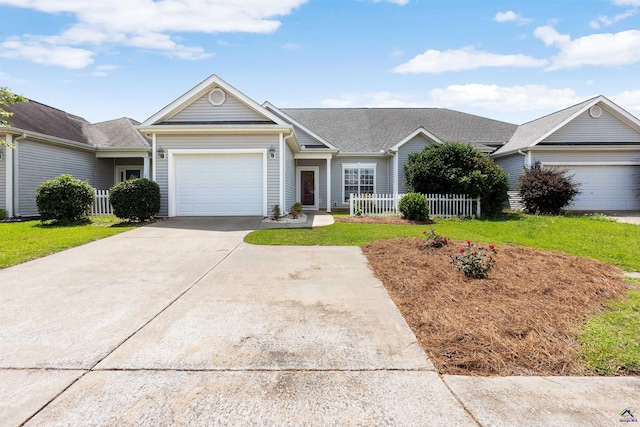 210 Vining Way, Byron, GA 31008 - view of front of house with concrete driveway and an attached garage