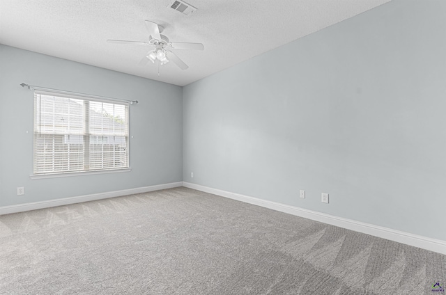 210 Vining Way, Byron, GA 31008 - unfurnished room featuring ceiling fan, a textured ceiling, carpet floors, and baseboards