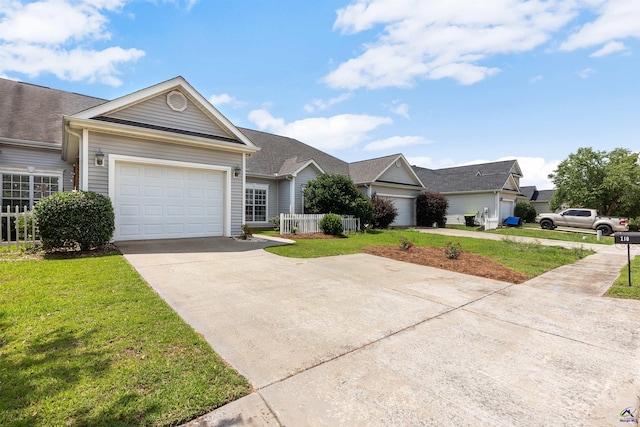 210 Vining Way, Byron, GA 31008 - single story home with driveway, a front yard, and a garage