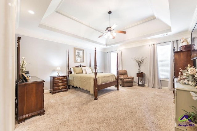 215 Wilson Creek Bnd, Bonaire, GA 31005 - bedroom with a raised ceiling, carpet flooring, baseboards, and a ceiling fan