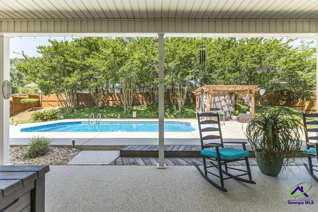 215 Wilson Creek Bnd, Bonaire, GA 31005 - view of swimming pool with a fenced backyard and a patio area