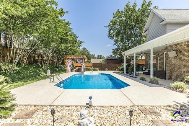 215 Wilson Creek Bnd, Bonaire, GA 31005 - view of swimming pool with an outdoor hangout area, a patio, a pergola, a fenced backyard, and a ceiling fan