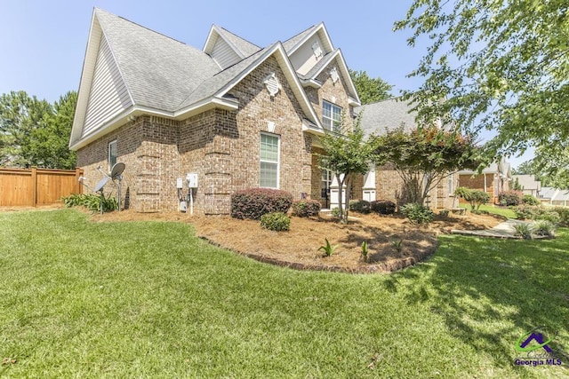 215 Wilson Creek Bnd, Bonaire, GA 31005 - view of property exterior with brick siding and roof with shingles