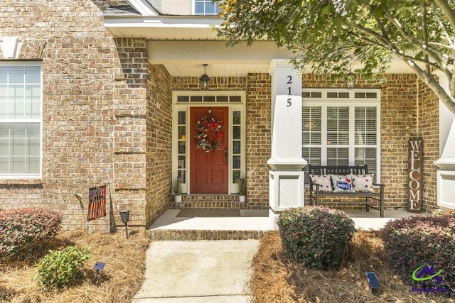 215 Wilson Creek Bnd, Bonaire, GA 31005 - property entrance with brick siding and covered porch