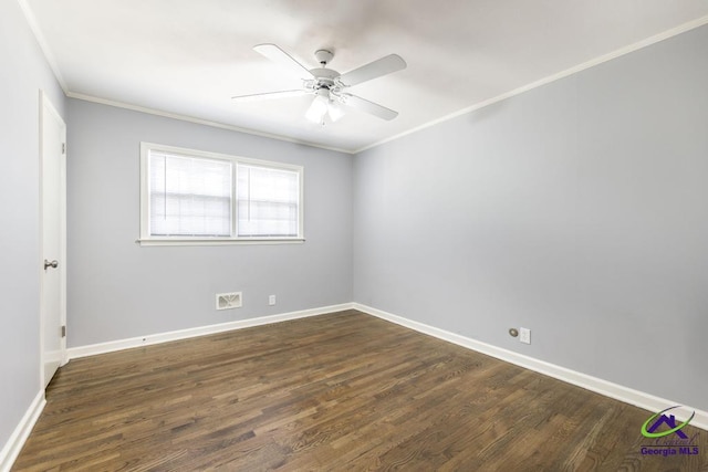 1035 S Pine Knoll Dr, Macon, GA 31204 - empty room with a ceiling fan, dark wood-style flooring, crown molding, and baseboards