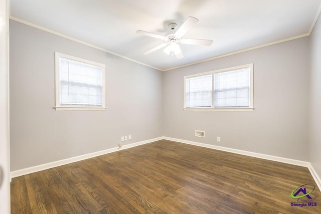 1035 S Pine Knoll Dr, Macon, GA 31204 - empty room featuring baseboards, dark wood-type flooring, crown molding, and a ceiling fan