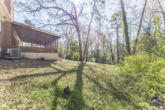 1035 S Pine Knoll Dr, Macon, GA 31204 - view of yard featuring central AC
