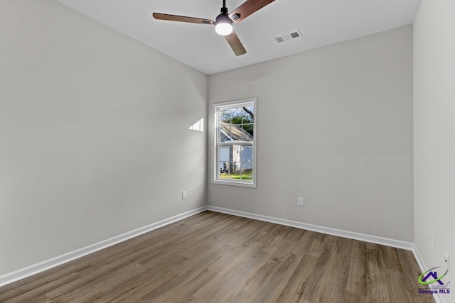 3054 Cellar Ln, Perry, GA 31069 - empty room featuring wood finished floors, a ceiling fan, and baseboards