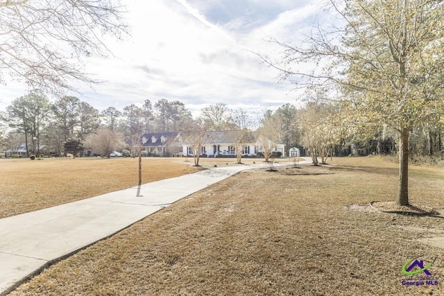 171 N Valhalla Dr, Cordele, GA 31015 - view of property's community with a lawn