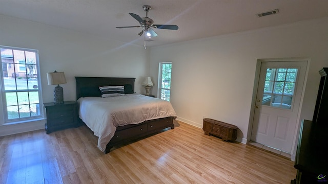 107 Whitney Ct, Warner Robins, GA 31088 - bedroom with light wood finished floors, baseboards, and ceiling fan