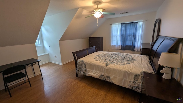 107 Whitney Ct, Warner Robins, GA 31088 - bedroom featuring wood finished floors, vaulted ceiling, a ceiling fan, and baseboards