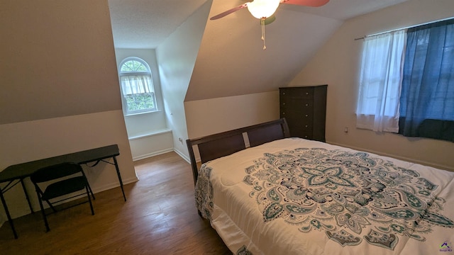 107 Whitney Ct, Warner Robins, GA 31088 - bedroom with vaulted ceiling, wood finished floors, baseboards, and ceiling fan