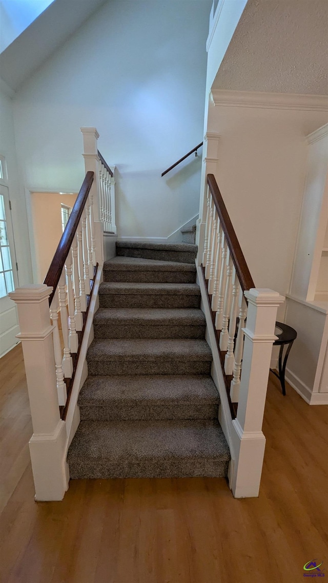 107 Whitney Ct, Warner Robins, GA 31088 - stairway with wood finished floors and ornamental molding