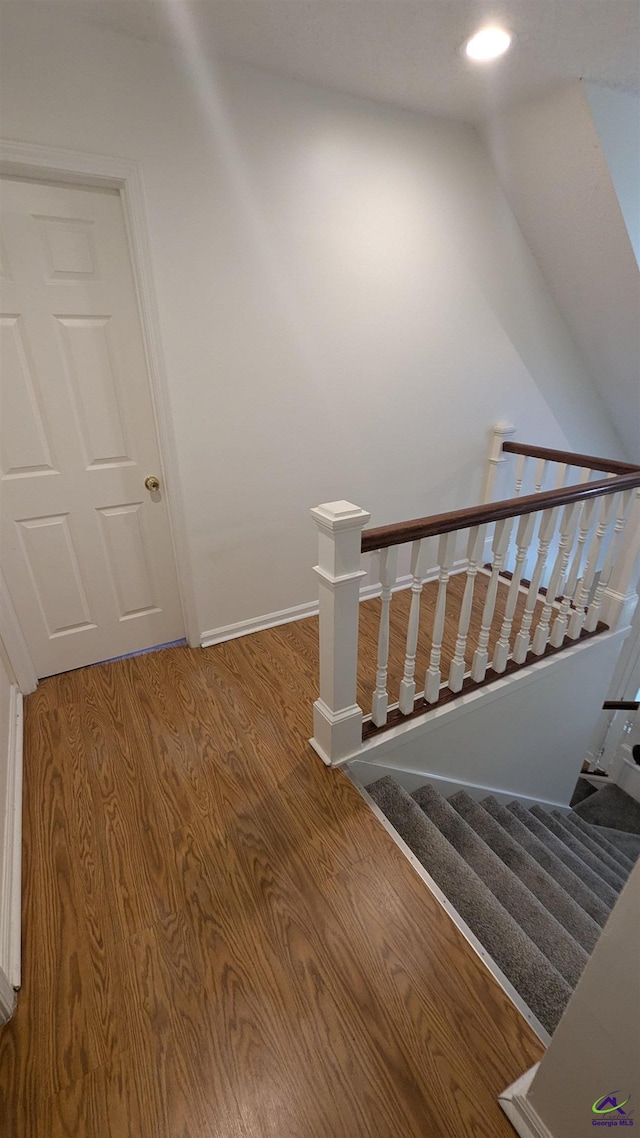 107 Whitney Ct, Warner Robins, GA 31088 - staircase featuring wood finished floors, baseboards, and recessed lighting