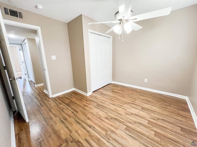 109 Stoneridge Dr, Warner Robins, GA 31088 - unfurnished bedroom featuring light wood-style floors, baseboards, a closet, and ceiling fan