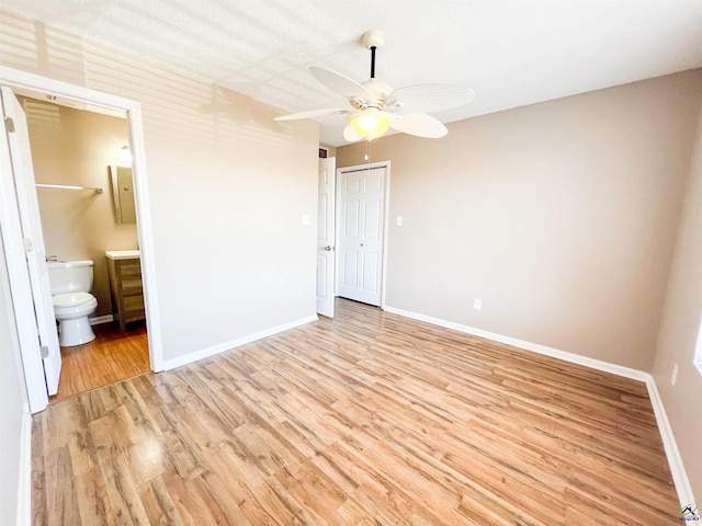 109 Stoneridge Dr, Warner Robins, GA 31088 - unfurnished bedroom featuring light wood-style flooring, baseboards, a closet, connected bathroom, and ceiling fan
