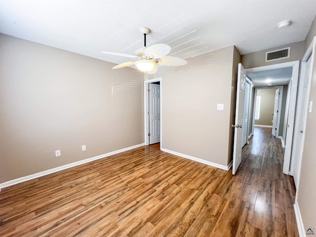 109 Stoneridge Dr, Warner Robins, GA 31088 - empty room featuring light wood-type flooring, baseboards, ceiling fan, and a textured ceiling